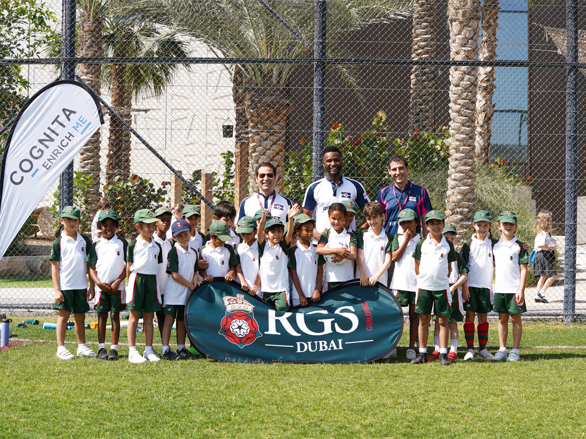 L-to-R-Mimoun Assraoui-John Obi Mikel-David Regueiro Santalla-celebrating with RGS Pupils after the match-GN