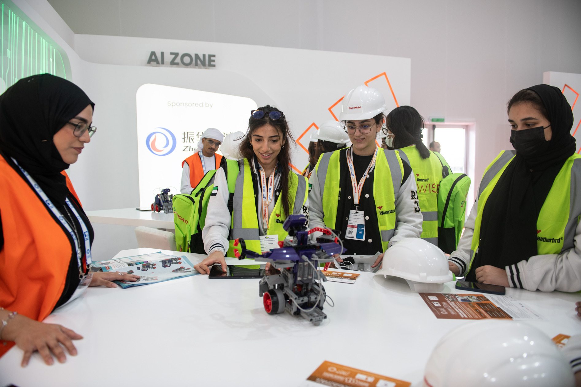 Young ADIPEC participants in AI Zone at ADIPEC 2022