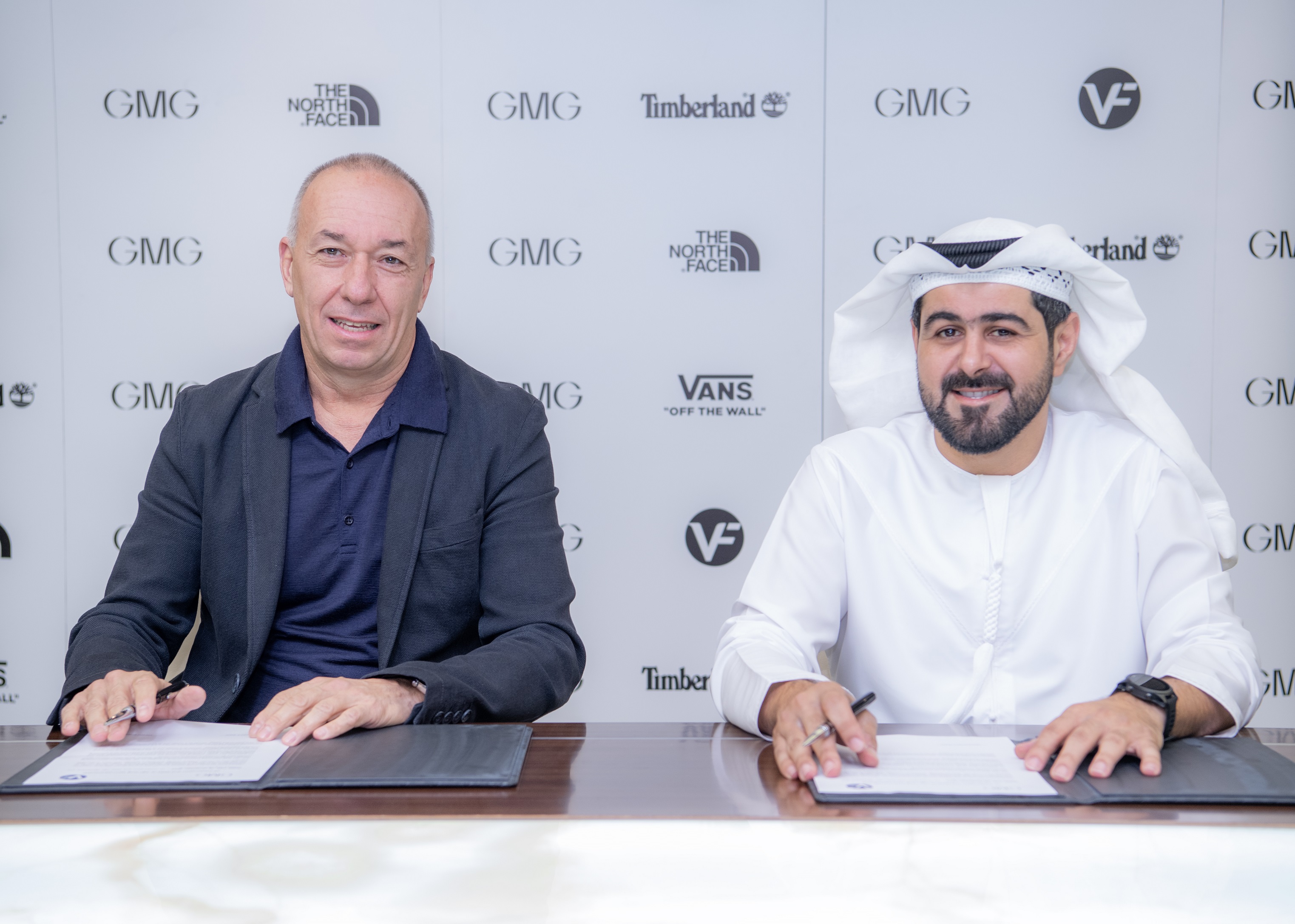 VF Corporation's Martino Scabbia Guerrini and GMG's Mohammad A. Baker sign partnership agreement