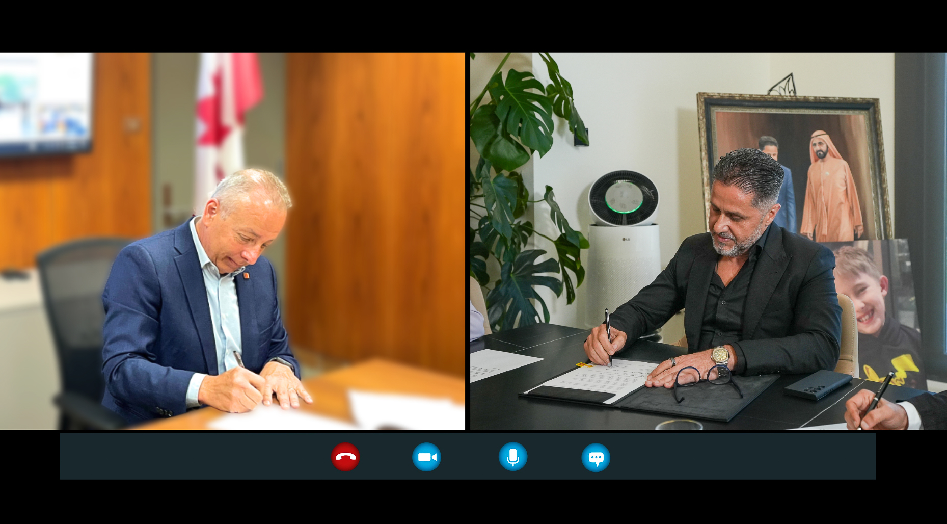 Signage of Agreement Between Engineer Faris Saeed and Paul Armstrong