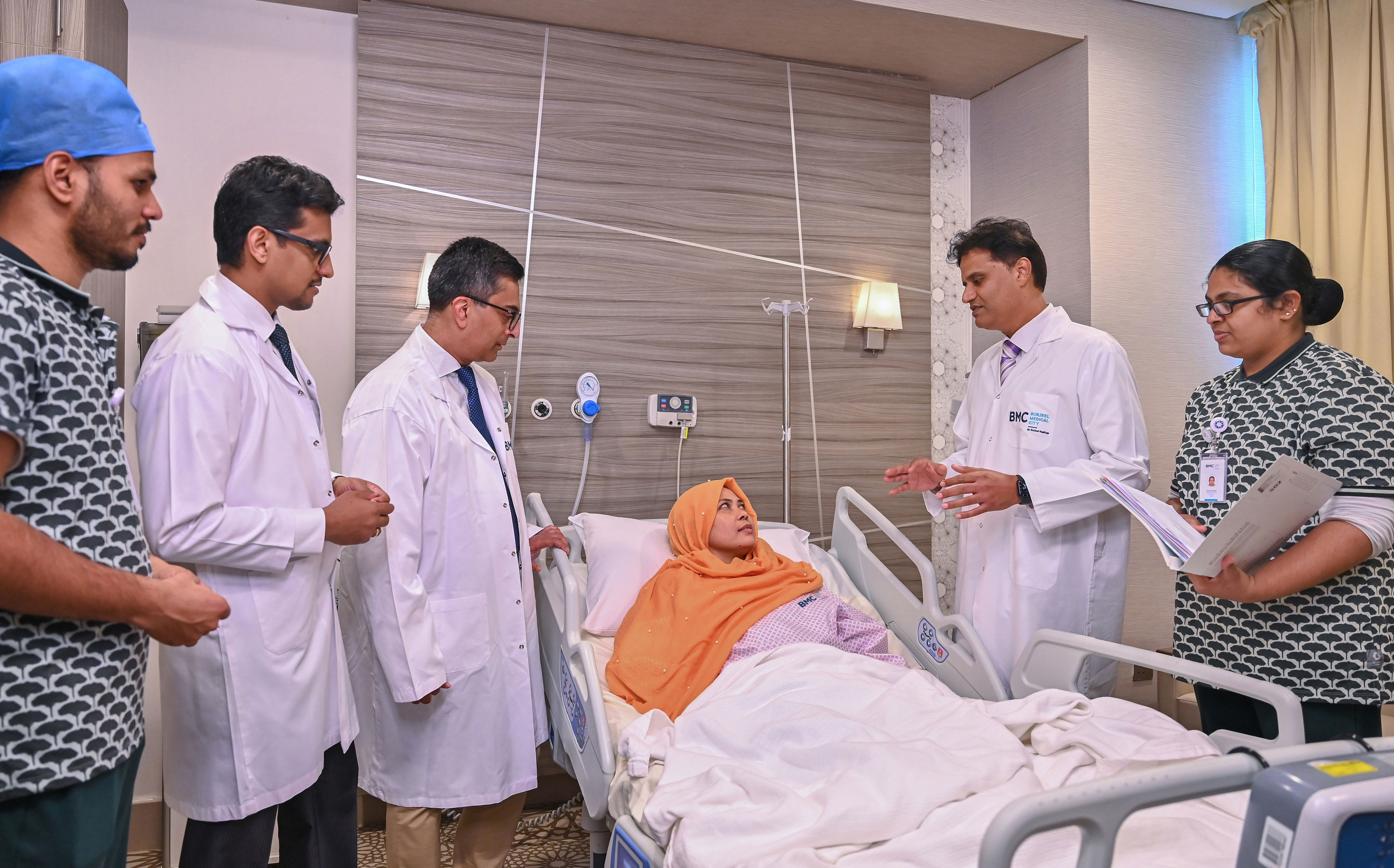 The team of doctors examines Nur following a life-saving liver transplant at Burjeel Medical City