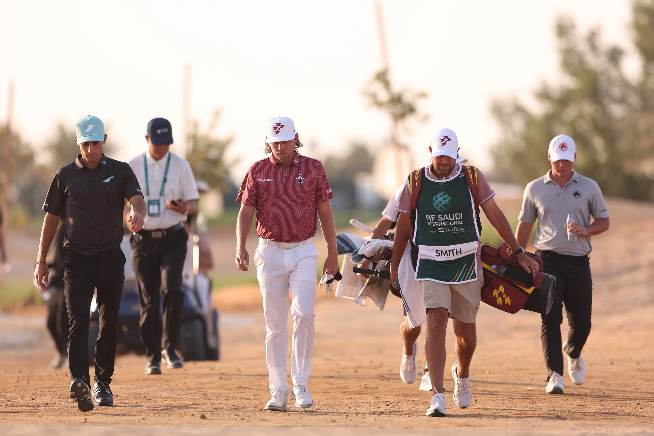 Joaqin Niemann, Cameron Smith, and Caleb Surratt during today's playoff