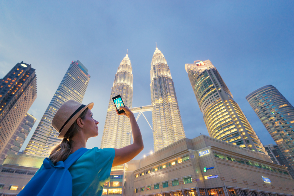 Travel,And,Technology.,Young,Woman,Taking,Photo,With,Her,Smartphone
